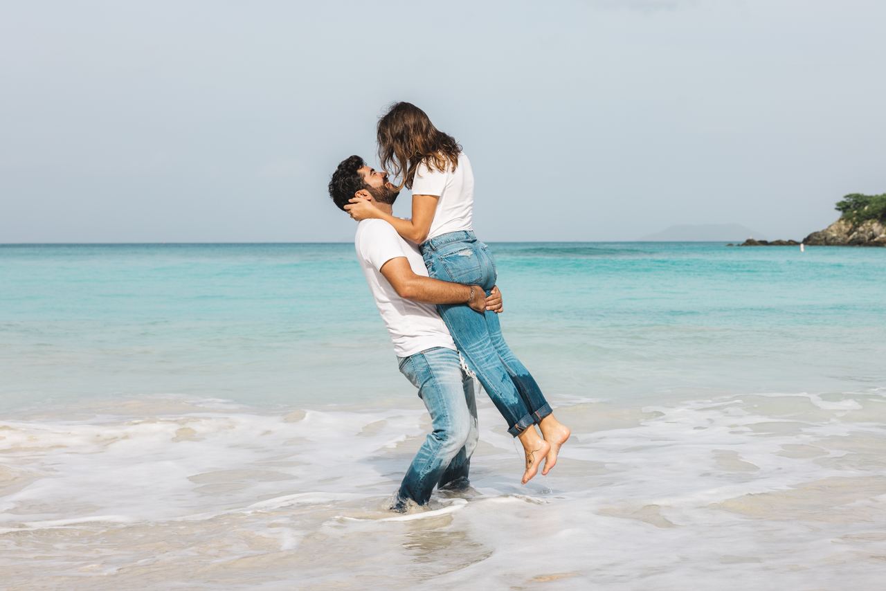 Couple at the shoreline on a Virgin Islands beach